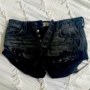 Free People black denim jean shorts